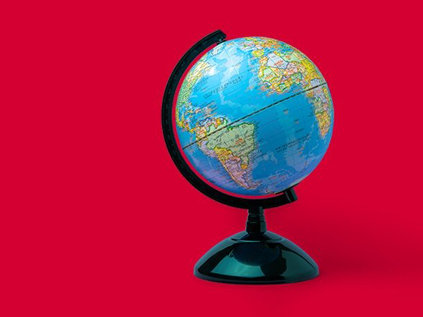 Globe on red background