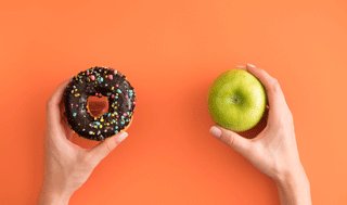 Comparing a donut with an apple